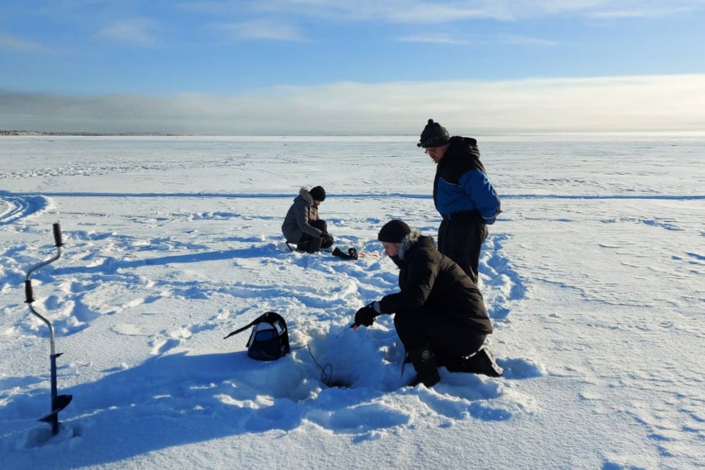 Finnaction_Ice fishing on the frozen sea