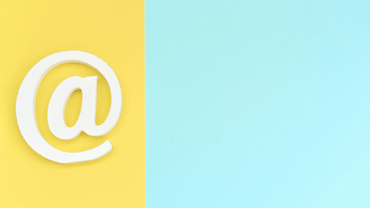 Email symbol on blue yellow background. Concept for email, internet, networking, email marketing communication or contact us@Yuliya Apanasenka