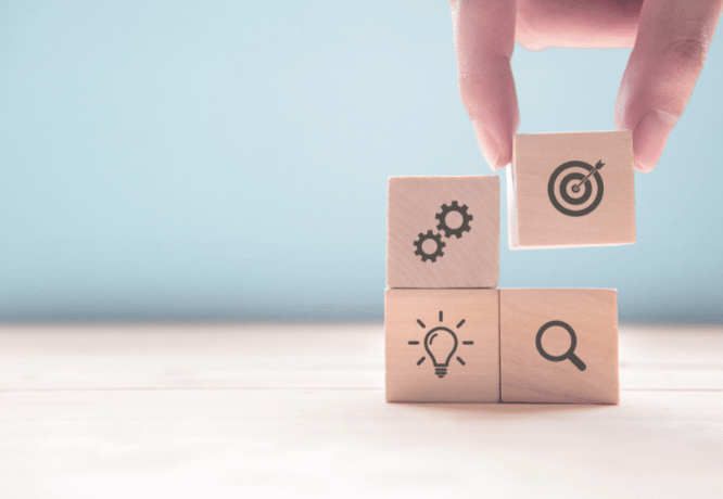 Businessman hand arranging wood block with icon business strategy and Action plan, copy space.@oatawa