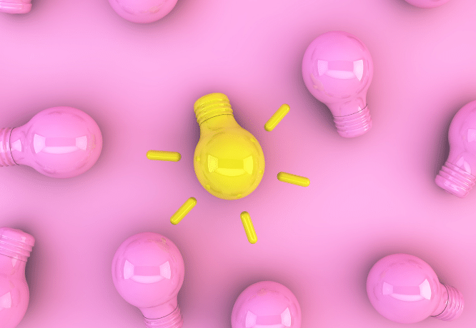 Pink Light Bulbs on a Pink Background. One of Them Is Yellow and@georgejportfolio
