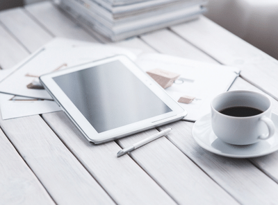 White tablet and cup of coffee@Kaboompics.com-Pexels