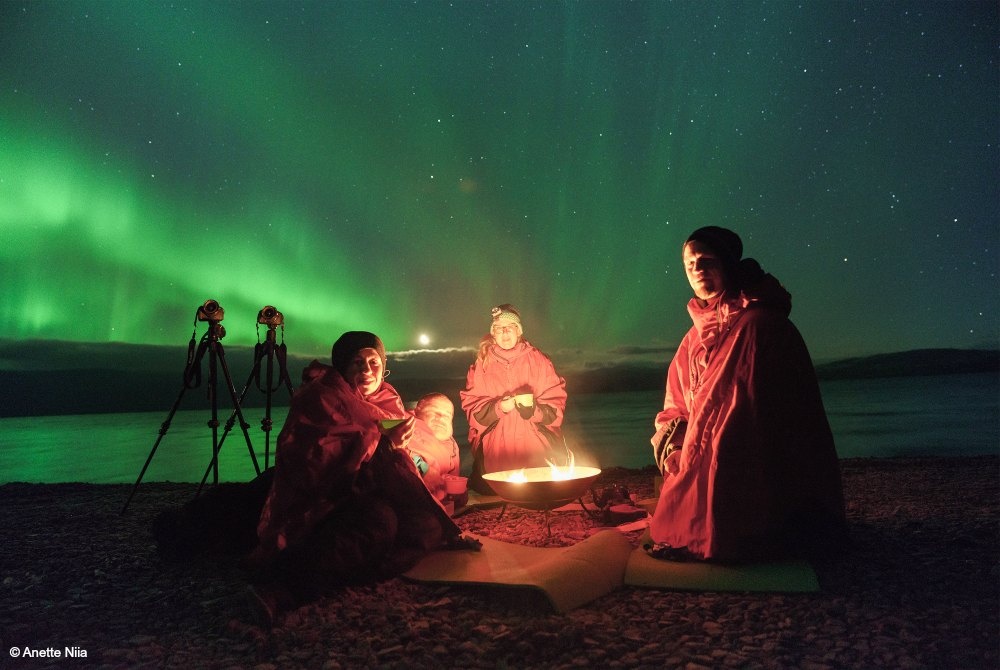 Campfire during a northern lights photo tour in Kiruna