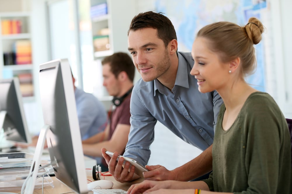 Student girl with trainer working on computer and tablet-2